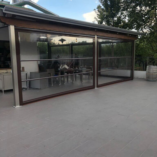 Tenda trasparente con guide per verande e chioschi AIRBENT