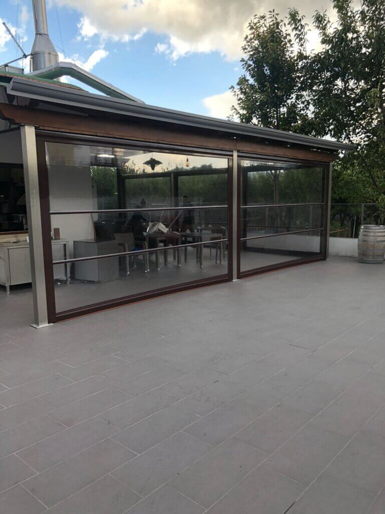 Tenda trasparente con guide per verande e chioschi AIRBENT